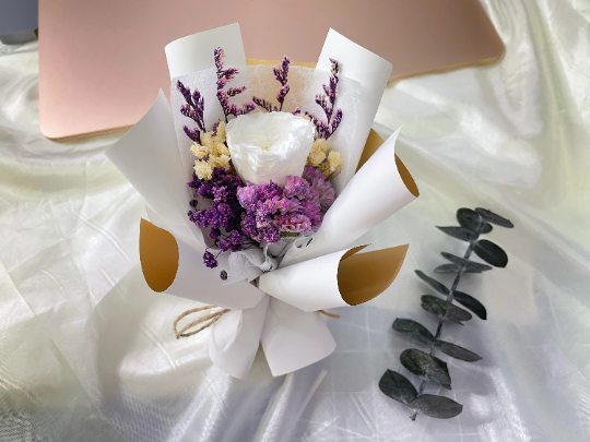 Car Decoration Dried Flower Bouquet with white rose in the center.